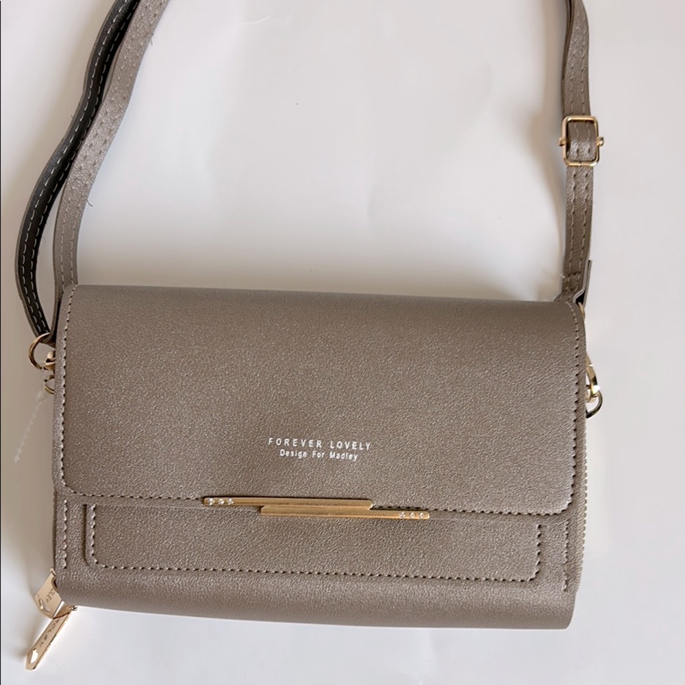 Forever Lovely Design for Madley crossbody bag/wallet.  NWOT